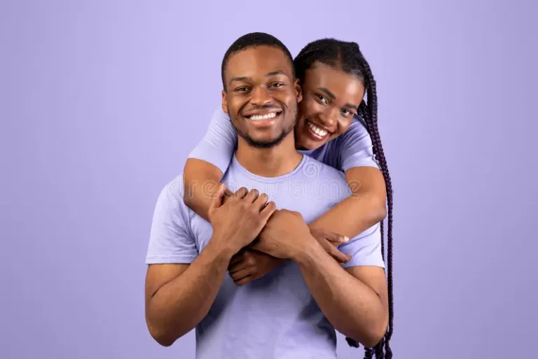 happy-woman-hugging-her-boyfriend-studio-couple-love-portrait-joyful-black-back-standing-together-isolated-over-361079546